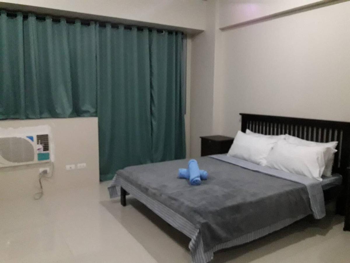 One Palm Tree Villas مانيلا المظهر الخارجي الصورة