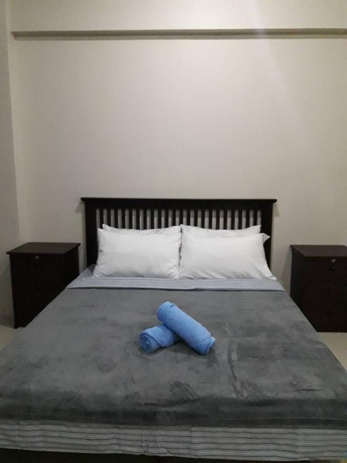 One Palm Tree Villas مانيلا المظهر الخارجي الصورة